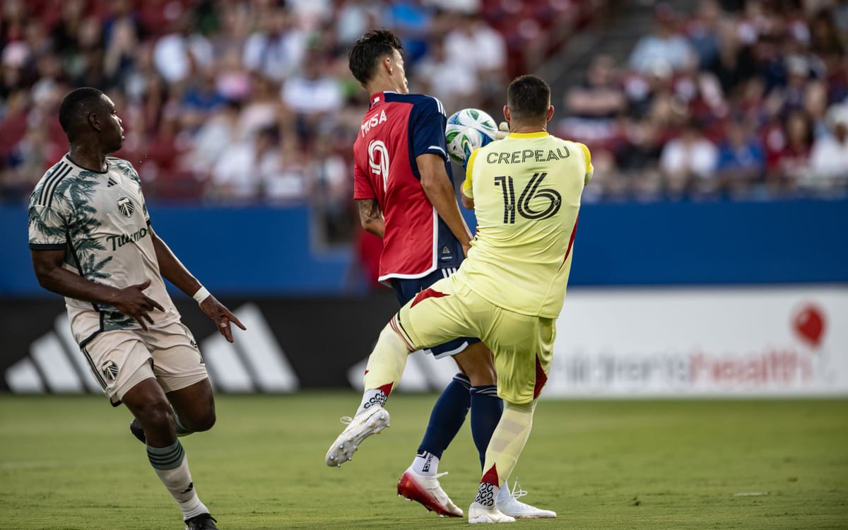 Petar Musa bumps into Maxim Crepeau to help score FC Dallas’ first goal. (Photo via Mike Brooks)