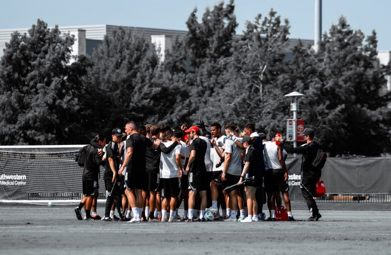 FC Dallas players huddle together in training. (Photo via FC Dallas)