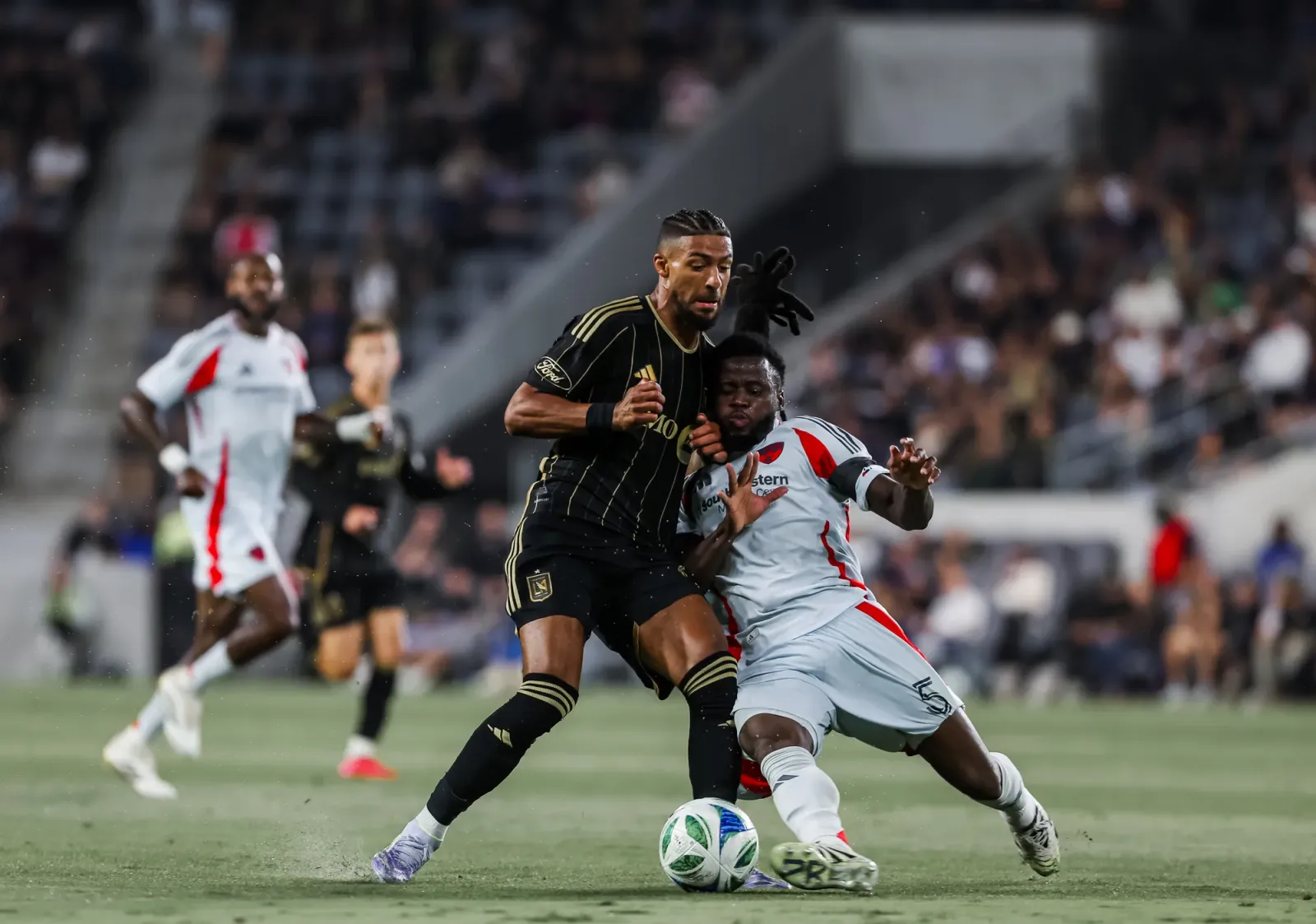 Lalas Abubakar battles LAFC. (Photo via LAFC)