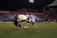 FC Dallas’ Bernard Kamungo dribbles past a LAFC defender. (Photo via FC Dallas)